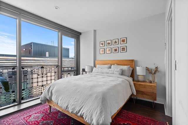 bedroom featuring dark hardwood / wood-style floors