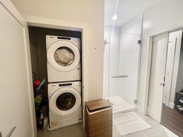 99 Sumner St Unit 307, Boston, MA 02128 - laundry area with stacked washer / dryer