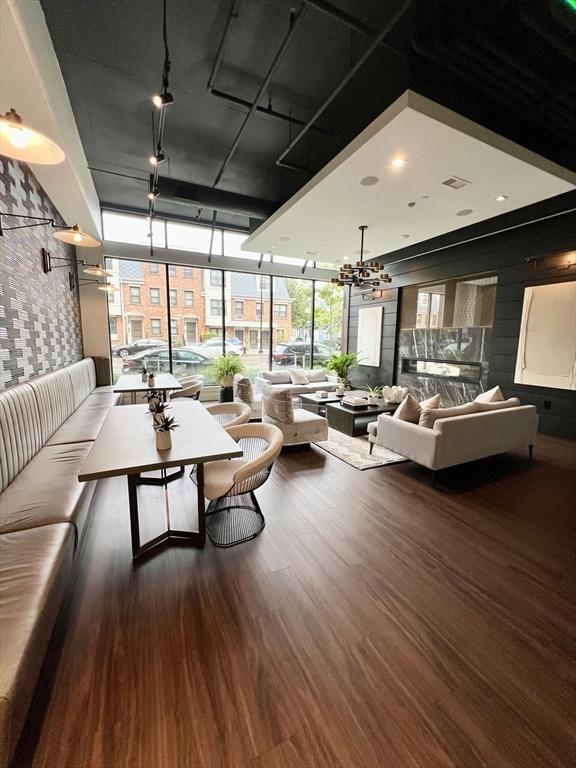 99 Sumner St Unit 307, Boston, MA 02128 - building lobby with a wall of windows