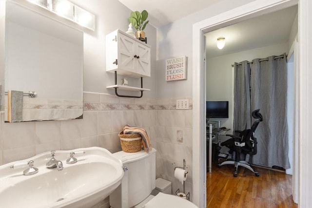 36-38 Priesing St, Boston, MA 02130 - bathroom featuring a sink, toilet, wood finished floors, and tile walls