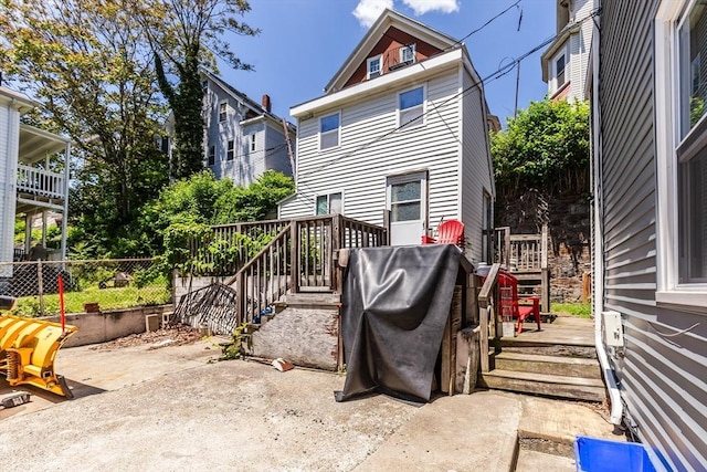 36-38 Priesing St, Boston, MA 02130 - rear view of property with a patio area