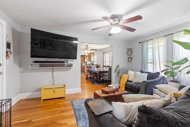 36-38 Priesing St, Boston, MA 02130 - living area featuring ceiling fan, light wood-style floors, and baseboards