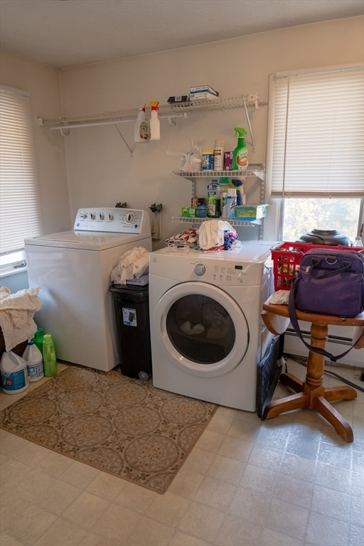 laundry room with independent washer and dryer