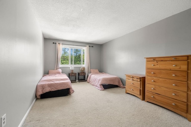 2012 Franklin Crossing Rd Unit 2012, Franklin, MA 02038 - bedroom with light carpet and a textured ceiling