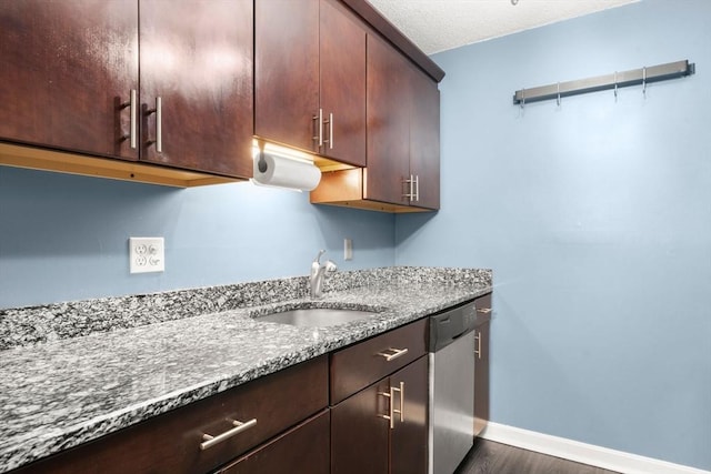 2012 Franklin Crossing Rd Unit 2012, Franklin, MA 02038 - kitchen featuring dishwasher, light stone countertops, dark brown cabinetry, and dark wood-style flooring
