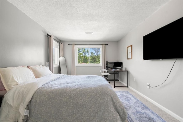 2012 Franklin Crossing Rd Unit 2012, Franklin, MA 02038 - bedroom featuring carpet and a textured ceiling