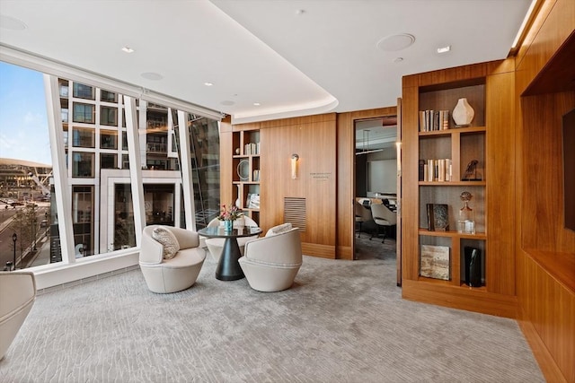 sitting room with carpet floors