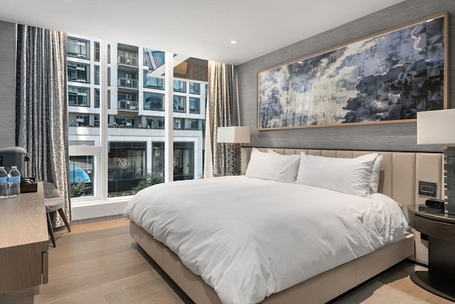 bedroom featuring light wood-type flooring