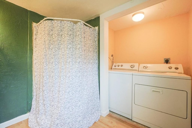 268 Wallace Hill Rd, Townsend, MA 01469 - laundry area featuring washer and dryer and light wood-style flooring