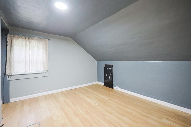 268 Wallace Hill Rd, Townsend, MA 01469 - bonus room with wood finished floors, vaulted ceiling, and baseboards