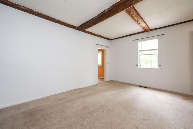 268 Wallace Hill Rd, Townsend, MA 01469 - carpeted spare room featuring beamed ceiling and baseboards