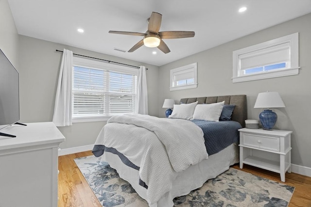 33 Peirce St Unit 1, Waltham, MA 02453 - bedroom featuring baseboards, recessed lighting, light wood-style floors, visible vents, and ceiling fan