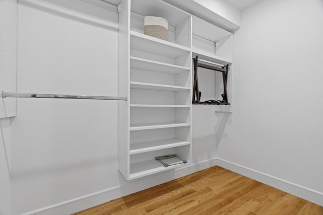 33 Peirce St Unit 1, Waltham, MA 02453 - walk in closet featuring wood finished floors