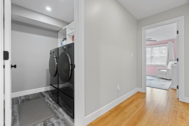 33 Peirce St Unit 1, Waltham, MA 02453 - clothes washing area with independent washer and dryer, laundry area, wood finished floors, and baseboards