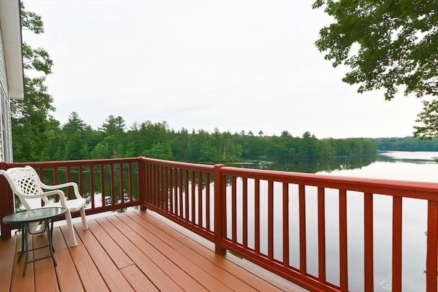 deck featuring a water view