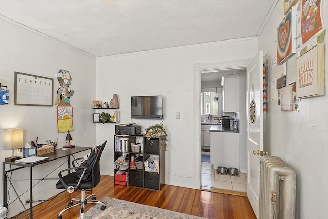 136-138 N St, Somerville, MA 02144 - office with crown molding, radiator, and wood finished floors