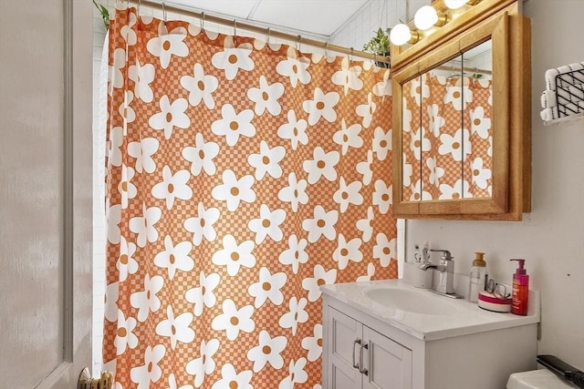 136-138 N St, Somerville, MA 02144 - bathroom with vanity, toilet, and curtained shower