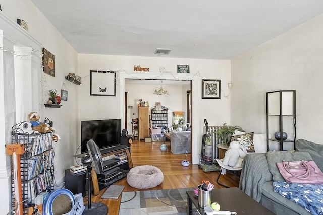 136-138 N St, Somerville, MA 02144 - living area with visible vents and wood finished floors