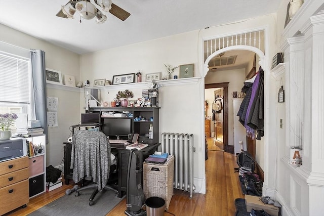 136-138 N St, Somerville, MA 02144 - office space featuring a ceiling fan, visible vents, wood finished floors, and radiator