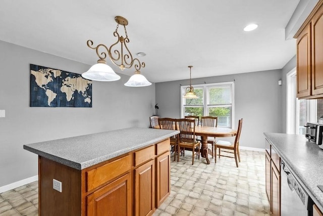 230 Plain, Taunton, MA 02780 - kitchen with a kitchen island, baseboards, pendant lighting, recessed lighting, and brown cabinets