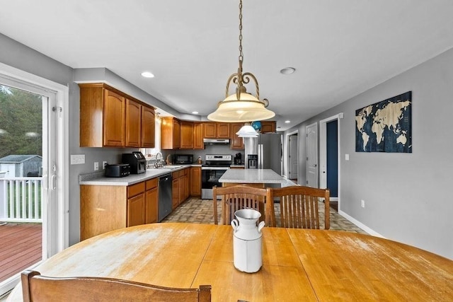 230 Plain, Taunton, MA 02780 - kitchen featuring appliances with stainless steel finishes, under cabinet range hood, a sink, recessed lighting, and light countertops