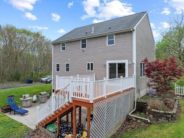 230 Plain, Taunton, MA 02780 - back of house with stairway, a patio, a deck, central air condition unit, and an outdoor fire pit