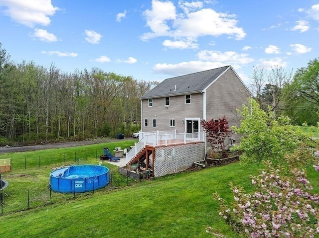 230 Plain, Taunton, MA 02780 - back of house with stairs, a deck, and an outdoor pool