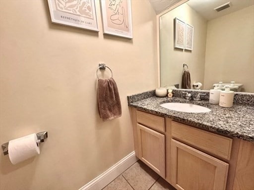 bathroom featuring vanity and tile patterned floors