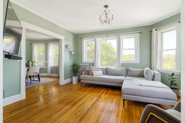 67 Jamaica Unit 3, Boston, MA 02130 - sunroom / solarium featuring radiator, plenty of natural light, and a chandelier