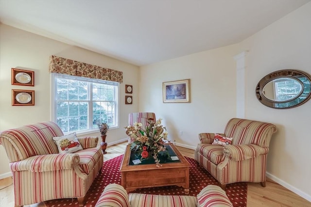 living room with light hardwood / wood-style floors