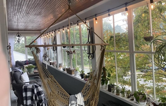 sunroom / solarium featuring a wealth of natural light