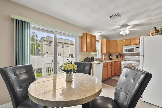 5239 N Main St Unit 7, Fall River, MA 02720 - dining space featuring ceiling fan and light tile patterned flooring
