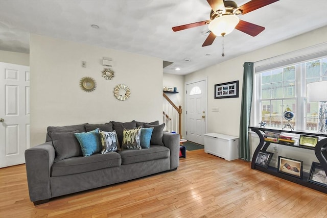 5239 N Main St Unit 7, Fall River, MA 02720 - living room with light wood-style floors, stairway, and a ceiling fan