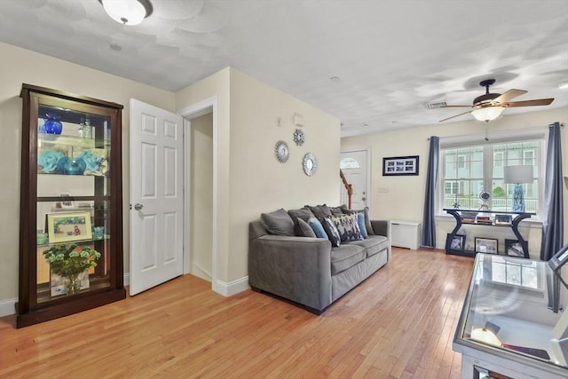 5239 N Main St Unit 7, Fall River, MA 02720 - living room with light wood-style floors, ceiling fan, and baseboards