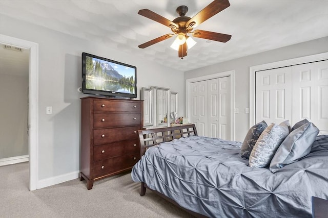 5239 N Main St Unit 7, Fall River, MA 02720 - bedroom with multiple closets, light colored carpet, baseboards, and a ceiling fan