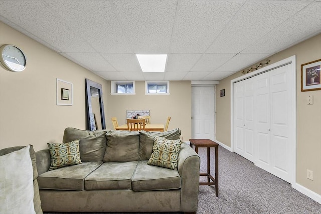5239 N Main St Unit 7, Fall River, MA 02720 - carpeted living room featuring a paneled ceiling and baseboards