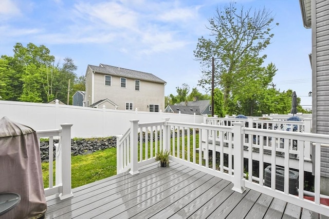 5239 N Main St Unit 7, Fall River, MA 02720 - wooden deck with a fenced backyard and central AC unit
