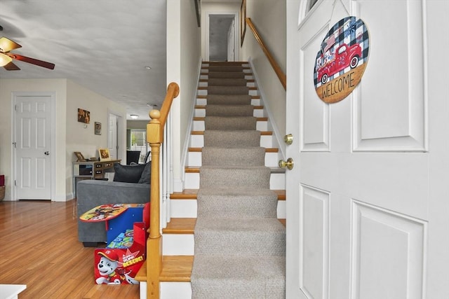 5239 N Main St Unit 7, Fall River, MA 02720 - stairway with a ceiling fan, wood finished floors, and baseboards