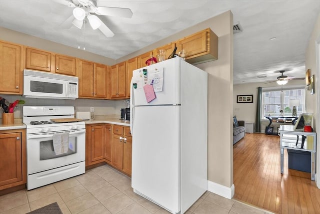 5239 N Main St Unit 7, Fall River, MA 02720 - kitchen featuring white appliances, ceiling fan, light countertops, and light tile patterned floors