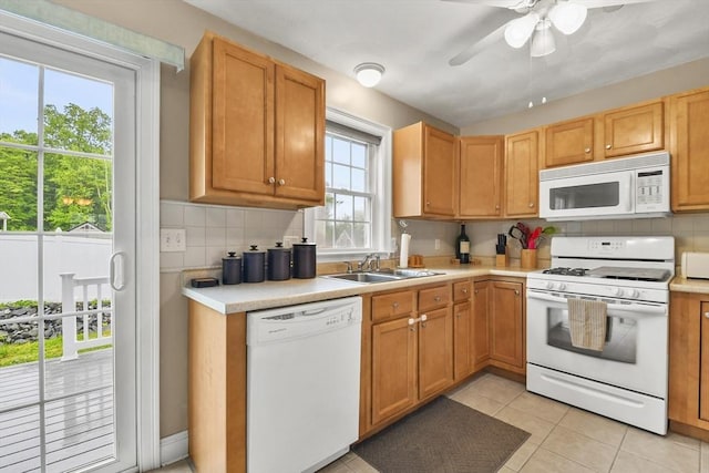 5239 N Main St Unit 7, Fall River, MA 02720 - kitchen with white appliances, a sink, light countertops, tasteful backsplash, and light tile patterned flooring