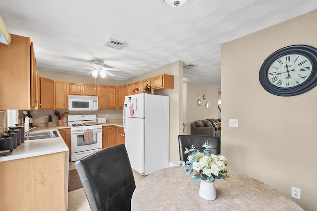5239 N Main St Unit 7, Fall River, MA 02720 - kitchen with white appliances, a sink, light countertops, a ceiling fan, and light tile patterned floors