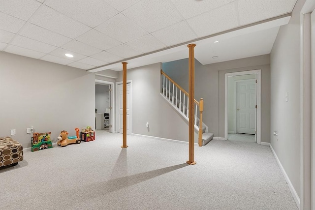 rec room with a drop ceiling, baseboards, carpet floors, and recessed lighting