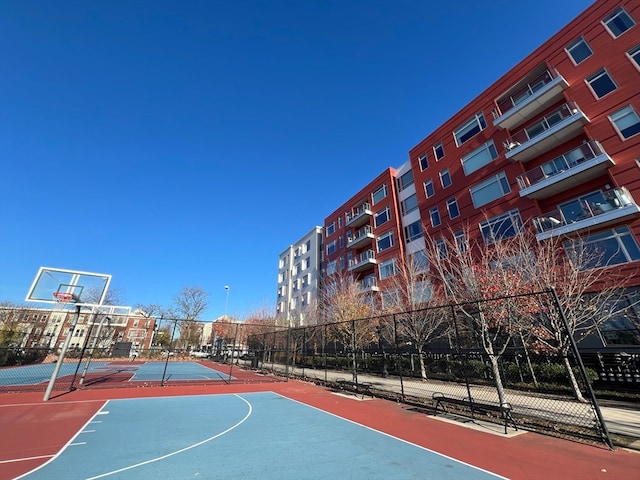 view of basketball court with tennis court