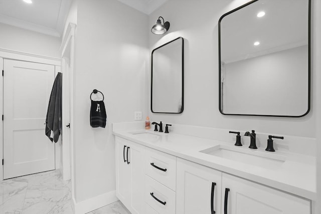 bathroom featuring vanity and ornamental molding