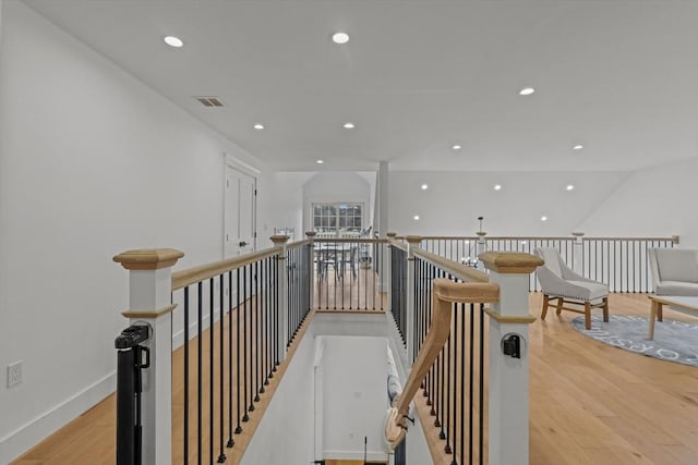 corridor featuring light hardwood / wood-style floors