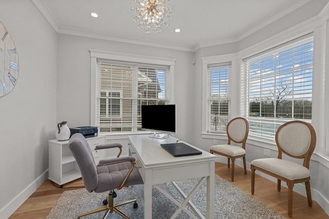 home office featuring light hardwood / wood-style flooring, a chandelier, and ornamental molding