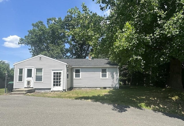 exterior space featuring a yard