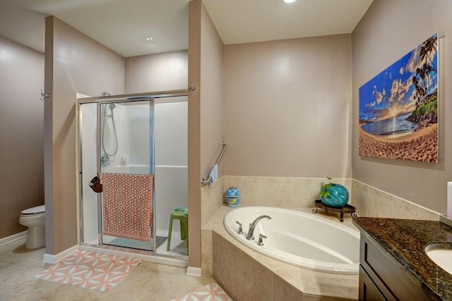 full bath featuring a garden tub, toilet, a shower stall, vanity, and tile patterned flooring