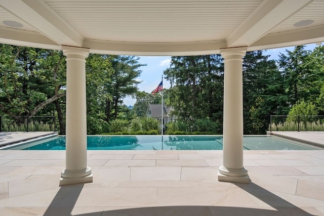 view of pool with a patio