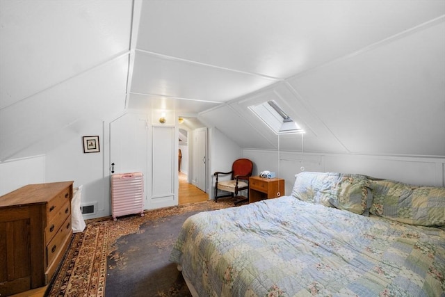 bedroom featuring lofted ceiling